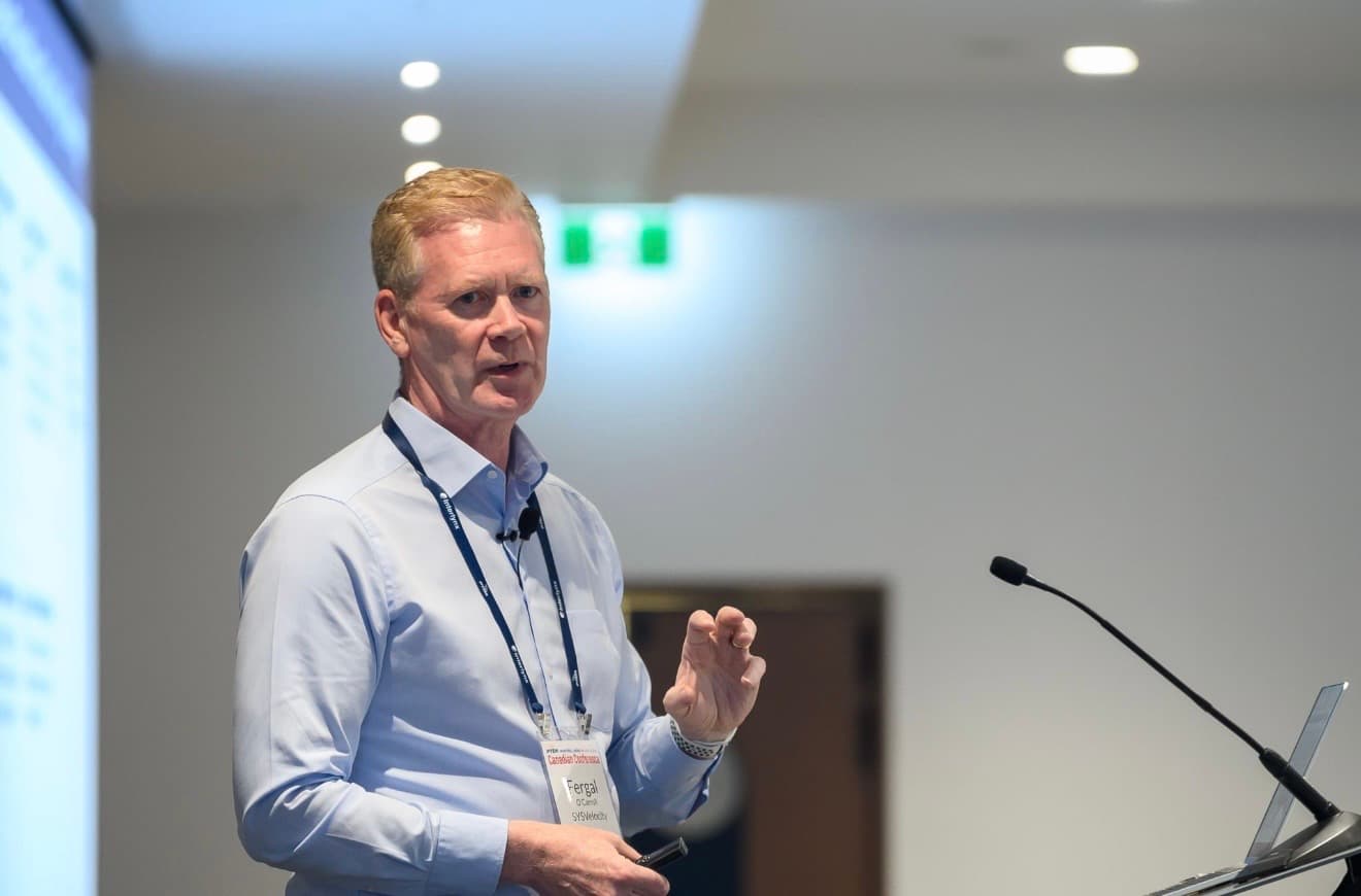Fergal O’Carroll speaking on stage at the PTDA Canadian Conference